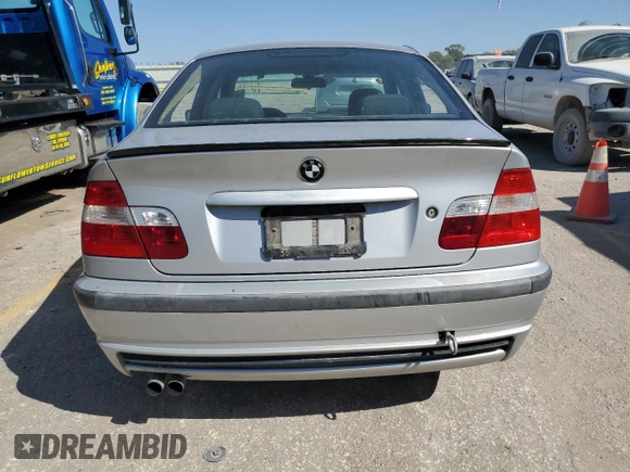 2003 BMW 3 Series 330xi with VIN WBAEW53413PG09450, listed as a Copart auction lot 74111954 with 252,295 mi miles and Salvage Title. Bid and sale history available at carsss.com. Image 6.