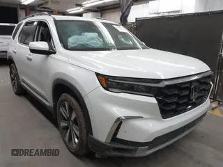 2024 Honda Pilot Touring z VIN 5FNYG1H71RB029155, wystawiony jako IAAI lot #42010586 z przebiegiem 12 577 mil mil oraz . Historia ofert i sprzedaży dostępna na DreamBid. Obrazek 1.