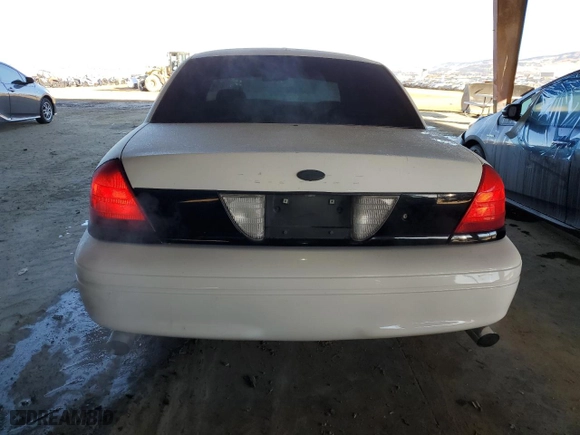 2005 Ford Police Interceptor with VIN 2FAFP71W85X105918, listed as a Copart auction lot 84010714 with 136,839 mi miles and Salvage Title. Bid and sale history available at carsss.com. Image 6.
