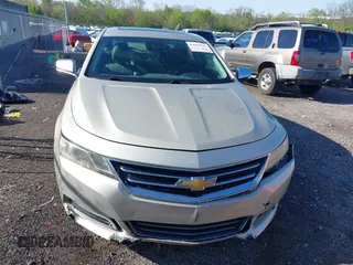 2014 Chevrolet Impala LTZ with VIN 2G1155S3XE9309815, listed as a IAAI auction lot 42039143 with 201,625 mi miles and . Bid and sale history available at DreamBid. Image 12.