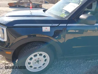 2023 Ford Bronco Sport Heritage z VIN 3FMCR9G64PRD34684, wystawiony jako IAAI lot #41609734 z przebiegiem 59 564 mil mil oraz . Historia ofert i sprzedaży dostępna na DreamBid. Obrazek 6.