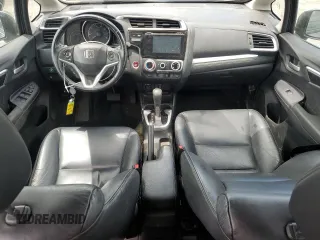 2015 Honda Fit EX-L z VIN 3HGGK5H8XFM776885, wystawiony jako Copart lot #57298225 z przebiegiem Nie podano mil oraz Szkoda całkowita • Salvage title. Historia ofert i sprzedaży dostępna na DreamBid. Obrazek 8.