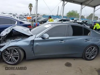 2015 Infiniti Q50 Premium with VIN JN1BV7AP1FM351633, listed as a IAAI auction lot 41880366 with 106,564 mi miles. Bid and sale history available at carsss.com. Image 15.
