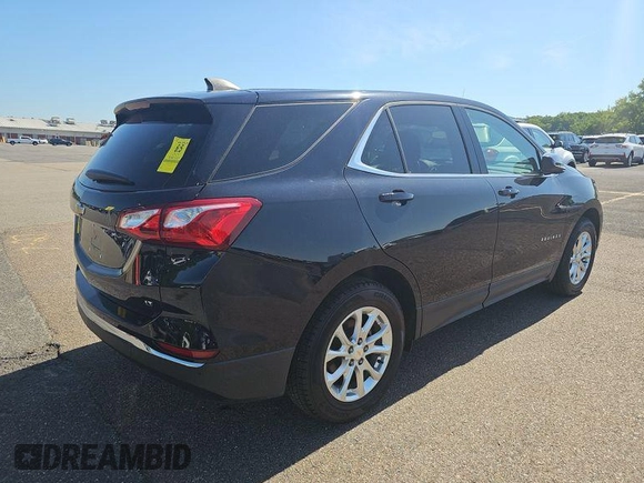 2020 Chevrolet Equinox LT with VIN 2GNAXJEVXL6233574, listed as a IAAI auction lot 42573162 with 58,591 mi miles and . Bid and sale history available at DreamBid. Image 4.