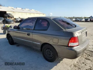 2002 Hyundai Accent GL with VIN KMHCG35C72U192411, listed as a Copart auction lot 85322524 with 130,977 mi miles and Salvage Title. Bid and sale history available at carsss.com. Image 2.