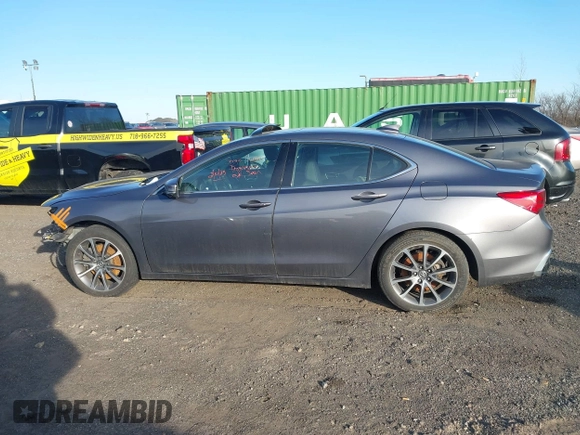 2019 Acura TLX with VIN 19UUB2F30KA002614, listed as a IAAI auction lot 41569334 with 96,320 mi miles and . Bid and sale history available at DreamBid. Image 13.