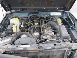 1996 Jeep Cherokee Sport with VIN 1J4FJ68S5TL235507, listed as a IAAI auction lot 41834736 with 174,634 mi miles. Bid and sale history available at carsss.com. Image 10.