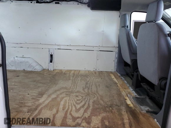2019 Ford Transit z VIN 1FTYE1YMXKKB70973, wystawiony jako Copart lot #50938595 z przebiegiem 181 879 mil mil oraz Szkoda całkowita • Salvage title. Historia ofert i sprzedaży dostępna na DreamBid. Obrazek 11.