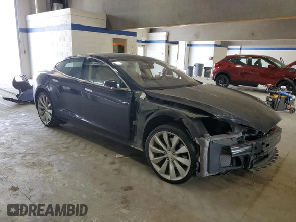 2014 Tesla Model S 60 with VIN 5YJSA1H10EFP52850, listed as a Copart auction lot 54321805 with 58,031 mi miles and Salvage Title. Bid and sale history available at DreamBid. Image 4.