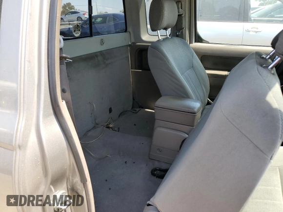 2004 Nissan Frontier XE z VIN 1N6DD26T64C430457, wystawiony jako Copart lot #60467035 z przebiegiem 229 743 mil mil oraz Czysty tytuł • Clean title. Historia ofert i sprzedaży dostępna na DreamBid. Obrazek 10.
