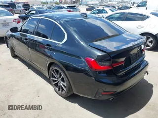 2021 BMW 3 Series 330i with VIN 3MW5R1J07M8B83681, listed as a IAAI auction lot 42238824 with 57,250 mi miles and . Bid and sale history available at DreamBid. Image 3.