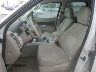 2009 Mercury Mariner with VIN 4M2CU91G09KJ20829, listed as a Copart auction lot 56006615 with 163,513 mi miles and Salvage title. Bid and sale history available at DreamBid. Image 7.