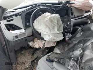 2018 Toyota Sienna LE z VIN 5TDJZ3DC6JS199103, wystawiony jako Copart lot #57821175 z przebiegiem Nie podano mil oraz Szkoda całkowita • Salvage title. Historia ofert i sprzedaży dostępna na DreamBid. Obrazek 8.