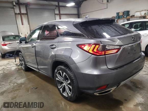 2021 Lexus RX with VIN 2T2HZMDAXMC307489, listed as a Copart auction lot 52098545 with 53,695 mi miles and Salvage Title. Bid and sale history available at carsss.com. Image 2.