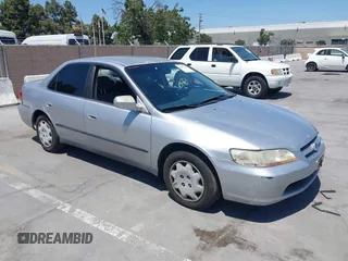 1999 Honda Accord LX with VIN JHMCG665XXC033464, listed as a IAAI auction lot 42687150 with 194,076 mi miles and . Bid and sale history available at DreamBid. Image 1.
