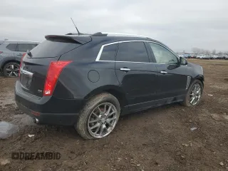2014 Cadillac SRX Luxury Collection z VIN 3GYFNEE34ES685593, wystawiony jako Copart lot #52202805 z przebiegiem 139 869 mil mil oraz Szkoda całkowita • Salvage title. Historia ofert i sprzedaży dostępna na DreamBid. Obrazek 3.