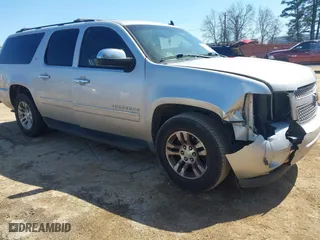 2011 Chevrolet Suburban LTZ with VIN 1GNSCKE04BR385153, listed as a IAAI auction lot 41720354 with 237,611 mi miles. Bid and sale history available at carsss.com. Image 1.