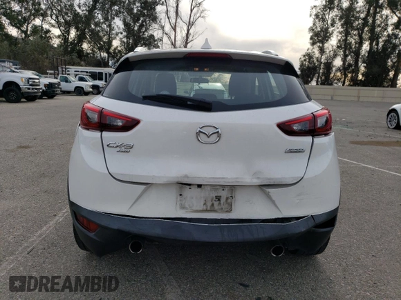 2016 Mazda CX-3 Touring with VIN JM1DKBC71G0123543, listed as a Copart auction lot 84657294 with 113,080 mi miles and Salvage Title. Bid and sale history available at carsss.com. Image 6.