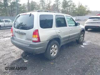 2001 Mazda Tribute LX with VIN 4F2YU08151KM06561, listed as a IAAI auction lot 41478779 with 54,826 mi miles and . Bid and sale history available at DreamBid. Image 4.