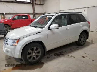 2012 Suzuki Grand Vitara Limited z VIN JS3TD0D70C4100901, wystawiony jako Copart lot #63846044 z przebiegiem 111 340 mil mil oraz Szkoda całkowita • Salvage title. Historia ofert i sprzedaży dostępna na DreamBid. Obrazek 1.