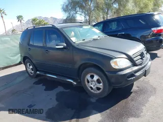 2004 Mercedes-Benz M 3.5L with VIN 4JGAB57EX4A464678, listed as a IAAI auction lot 41896665 with 158,391 mi miles. Bid and sale history available at carsss.com. Image 1.