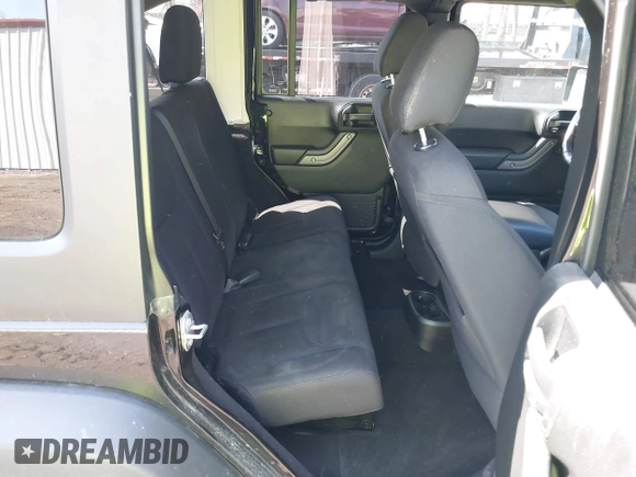 2018 Jeep Wrangler Unlimited Sport with VIN 1C4BJWDG7JL888844, listed as a IAAI auction lot 41909165 with 70,117 mi miles and . Bid and sale history available at DreamBid. Image 8.