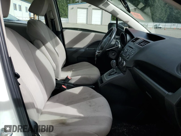 2013 Mazda 5 Sport with VIN JM1CW2BL6D0149713, listed as a Copart auction lot 50069095 with 71,987 mi miles and Salvage Title. Bid and sale history available at DreamBid. Image 7.