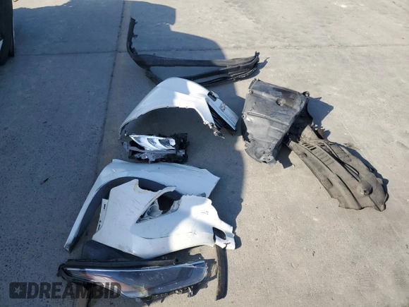 2020 Toyota Highlander L z VIN 5TDCZRAH0LS505372, wystawiony jako Copart lot #50716035 z przebiegiem 125 735 mil mil oraz Czysty tytuł • Clean title. Historia ofert i sprzedaży dostępna na DreamBid. Obrazek 13.