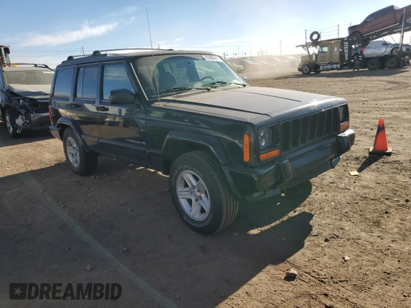 2001 Jeep Cherokee Sport with VIN 1J4FF58S71L540211, listed as a Copart auction lot 87089444 with 190,711 mi miles and Clean title. Bid and sale history available at DreamBid. Image 4.