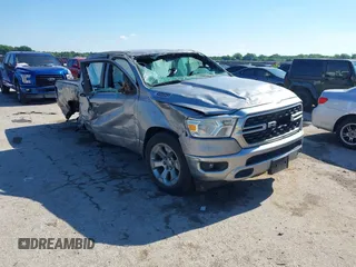 2022 Ram 1500 Lone Star with VIN 1C6RREFT3NN336321, listed as a IAAI auction lot 42190485 with 106,221 mi miles and . Bid and sale history available at DreamBid. Image 1.