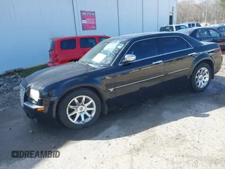 2005 Chrysler 300 with VIN 2C3AA63H65H145122, listed as a IAAI auction lot 41847043 with 237,757 mi miles. Bid and sale history available at carsss.com. Image 2.
