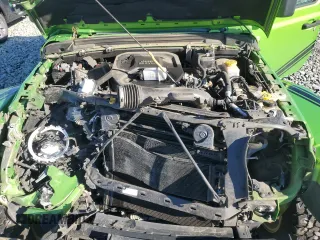 2019 Jeep Wrangler Unlimited Sahara with VIN 1C4HJXEN2KW510038, listed as a Copart auction lot 89243675 with 142,738 mi miles and Salvage title. Bid and sale history available at DreamBid. Image 12.