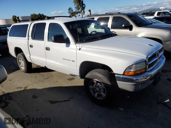 2001 Dodge Dakota z VIN 1B7HG2AX01S229161, wystawiony jako Copart lot #44562925 z przebiegiem 151 690 mil mil oraz Czysty tytuł • Clean title. Historia ofert i sprzedaży dostępna na DreamBid. Obrazek 4.