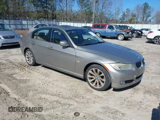 2011 BMW 3 Series 328i with VIN WBAPH7C56BE678004, listed as a IAAI auction lot 41812732 with 218,149 mi miles. Bid and sale history available at carsss.com. Image 1.