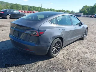 2023 Tesla Model 3 z VIN 5YJ3E1EA2PF492659, wystawiony jako IAAI lot #42284833 z przebiegiem 41 205 mil mil oraz . Historia ofert i sprzedaży dostępna na DreamBid. Obrazek 4.