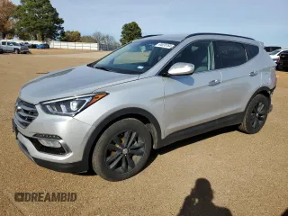 2018 Hyundai Santa Fe 2.0T with VIN 5XYZUDLA8JG536519, listed as a Copart auction lot 84020764 with 128,568 mi miles and Salvage title. Bid and sale history available at DreamBid. Image 1.