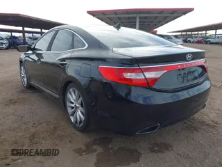 2013 Hyundai Azera z VIN KMHFH4JG8DA329143, wystawiony jako IAAI lot #41933036 z przebiegiem Nie podano mil oraz . Historia ofert i sprzedaży dostępna na DreamBid. Obrazek 3.