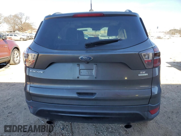 2017 Ford Escape SE with VIN 1FMCU0GD8HUA89018, listed as a Copart auction lot 45302875 with 101,182 mi miles and Salvage Title. Bid and sale history available at carsss.com. Image 6.