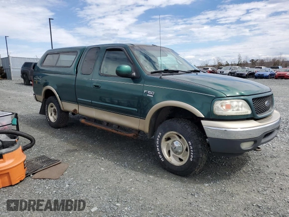 2000 Ford F-150 XL with VIN 1FTRX18L5YNB03646, listed as a Copart auction lot 51896585 with 224,065 mi miles and Clean Title. Bid and sale history available at carsss.com. Image 4.