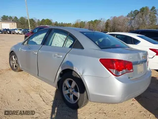 2015 Chevrolet Cruze LT with VIN 1G1PC5SBXF7123458, listed as a IAAI auction lot 41770187 with 153,477 mi miles. Bid and sale history available at carsss.com. Image 3.