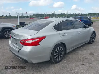 2017 Nissan Altima SV with VIN 1N4AL3AP7HC188945, listed as a IAAI auction lot 42111225 with 157,185 mi miles and . Bid and sale history available at carsss.com. Image 4.