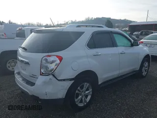 2013 Chevrolet Equinox LTZ z VIN 2GNFLGE36D6390653, wystawiony jako IAAI lot #40974858 z przebiegiem 128 954 mil mil oraz . Historia ofert i sprzedaży dostępna na DreamBid. Obrazek 4.