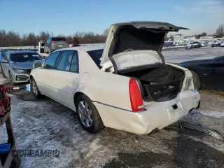 2007 Cadillac DTS Luxury I z VIN 1G6KD57Y57U223002, wystawiony jako Copart lot #87247984 z przebiegiem Nie podano mil oraz Szkoda całkowita • Salvage title. Historia ofert i sprzedaży dostępna na DreamBid. Obrazek 2.