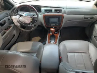 2005 Mercury Sable LS z VIN 1MEFM55S75A619345, wystawiony jako Copart lot #55858325 z przebiegiem Nie podano mil oraz Szkoda całkowita • Salvage title. Historia ofert i sprzedaży dostępna na DreamBid. Obrazek 8.
