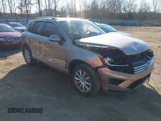 2016 Volkswagen Touareg Sport with VIN WVGEF9BP0GD003241, listed as a IAAI auction lot 41498797 with 90,141 mi miles and . Bid and sale history available at DreamBid. Image 1.