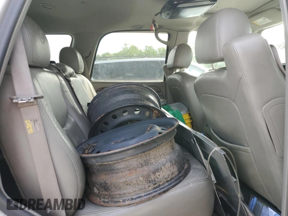2006 Cadillac Escalade z VIN 1GYEK63N76R136618, wystawiony jako Copart lot #58990945 z przebiegiem Nie podano mil oraz Czysty tytuł • Clean title. Historia ofert i sprzedaży dostępna na DreamBid. Obrazek 11.
