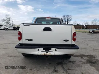 1998 Ford F-150 with VIN 1FTZF0768WKB35711, listed as a Copart auction lot 50441605 with 165,604 mi miles and Salvage title. Bid and sale history available at DreamBid. Image 6.