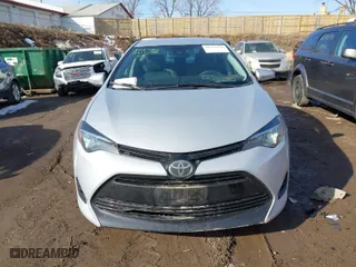 2019 Toyota Corolla L with VIN 2T1BURHE1KC136437, listed as a IAAI auction lot 41763222 with 117,152 mi miles. Bid and sale history available at carsss.com. Image 12.