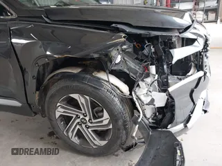 2023 Hyundai Santa Fe SEL with VIN 5NMS3DAJ6PH608467, listed as a IAAI auction lot 41957185 with 8,672 mi miles and . Bid and sale history available at DreamBid. Image 6.