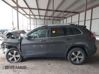 2020 Jeep Cherokee Limited z VIN 1C4PJLDBXLD587216, wystawiony jako IAAI lot #41941781 z przebiegiem Nie podano mil oraz . Historia ofert i sprzedaży dostępna na DreamBid. Obrazek 14.